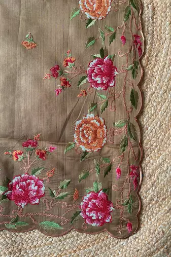Brown matka silk saree with heavy floral embroidery border with running blouse