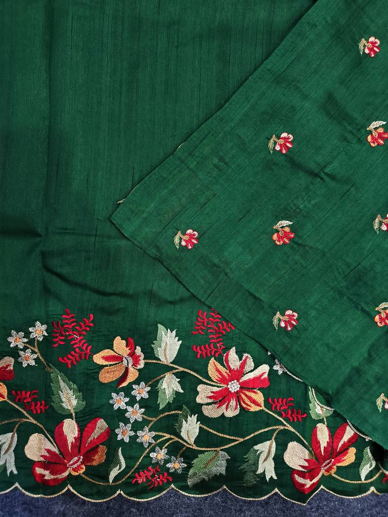 Green matka silk saree with heavy floral embroidery border with running blouse