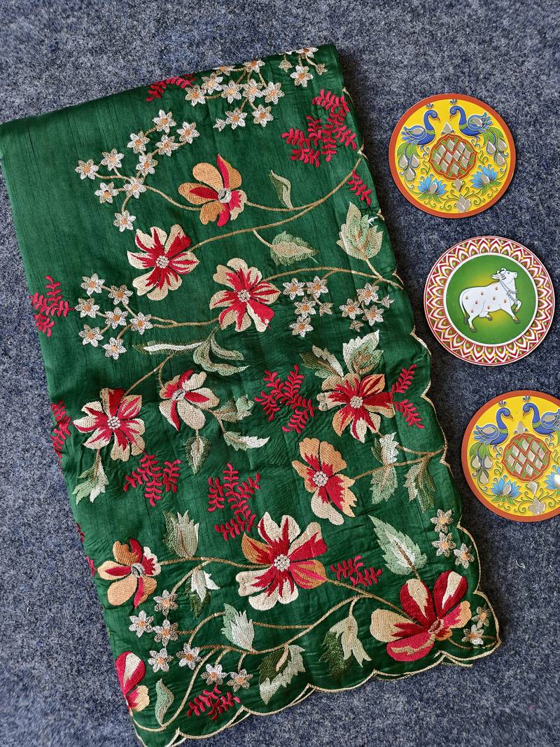 Green matka silk saree with heavy floral embroidery border with running blouse