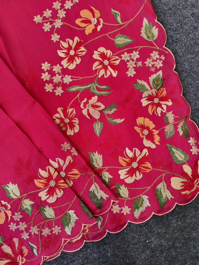 Red matka silk saree with heavy floral embroidery border with running blouse