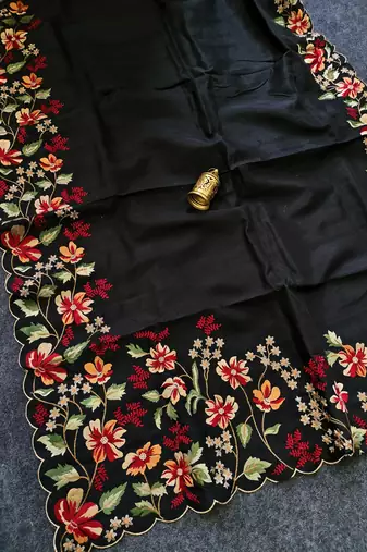 Black matka silk saree with heavy floral embroidery border with running blouse
