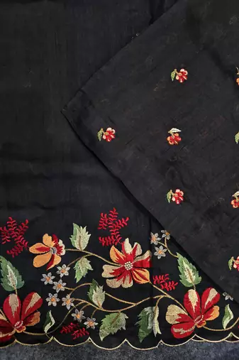 Black matka silk saree with heavy floral embroidery border with running blouse