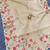 Cream matka silk saree with heavy floral embroidery border with running blouse