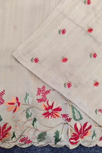 Cream matka silk saree with heavy floral embroidery border with running blouse