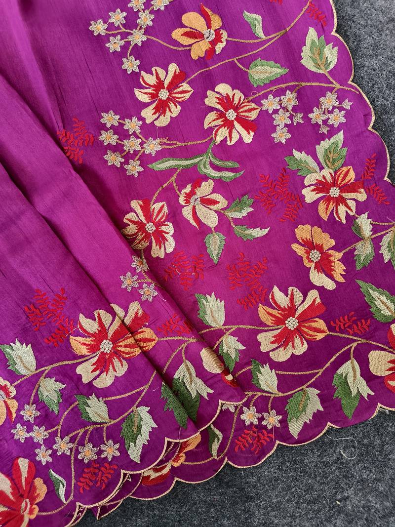 Rani pink matka silk blend saree with heavy floral embroidery border with running blouse