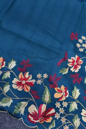 Blue matka silk saree with heavy floral embroidery border with running blouse