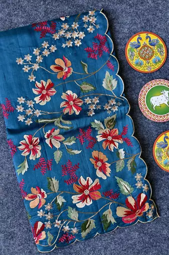 Blue matka silk saree with heavy floral embroidery border with running blouse