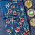 Blue matka silk saree with heavy floral embroidery border with running blouse