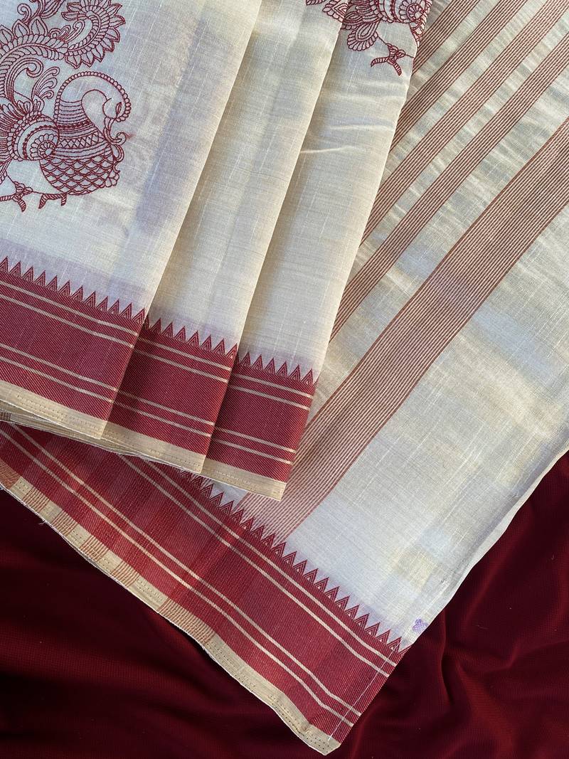 Red tussar silk multi thread peacock motifs saree