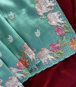 Sea-geen color embrodied elephant design panel with cutwork and hole work silk blend saree