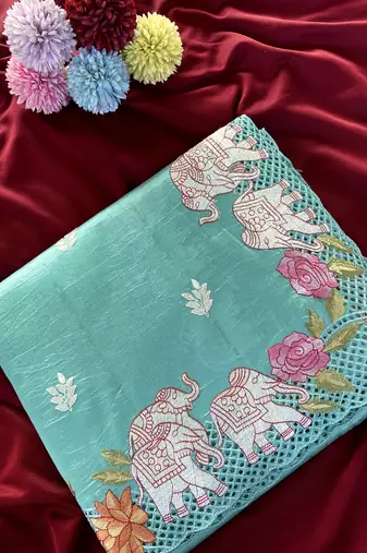 Sea-geen color embrodied elephant design panel with cutwork and hole work silk blend saree