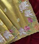 Yellow color embrodied elephant design panel with cutwork and hole work silk blend saree