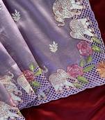 Lavender color embrodied elephant design panel with cutwork and hole work silk blend saree