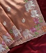 Orange color embrodied elephant design panel with cutwork and hole work silk blend saree