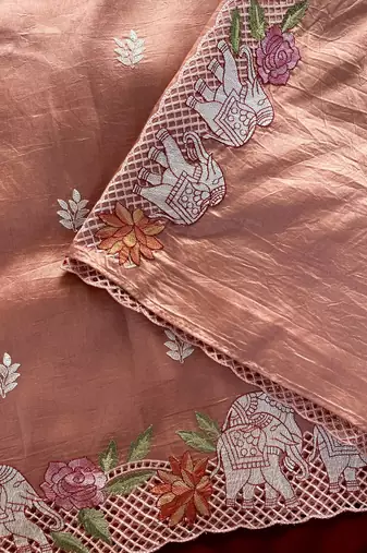 Orange color embrodied elephant design panel with cutwork and hole work silk blend saree