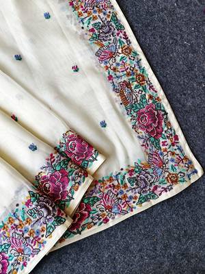 White tissue viscose saree features a heavy floral embroidered border and all-over buttis 3
