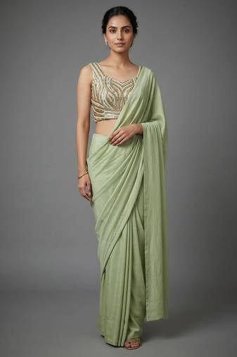Pista beads work shiny georgette partywear saree with full of beads work blouse fabric.