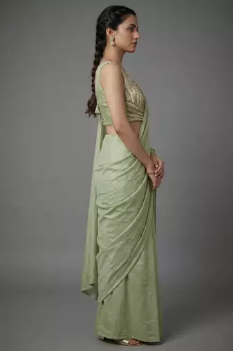 Pista beads work shiny georgette partywear saree with full of beads work blouse fabric.
