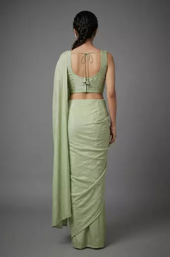 Pista beads work shiny georgette partywear saree with full of beads work blouse fabric.