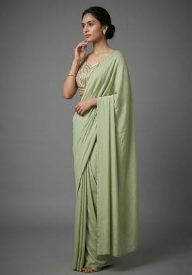 Pista beads work shiny georgette partywear saree with full of beads work blouse fabric. 5