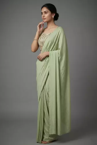 Pista beads work shiny georgette partywear saree with full of beads work blouse fabric.