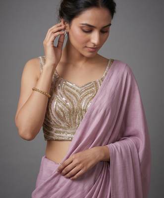 Light purple beads work shiny georgette partywear saree with full of beads work blouse fabric. 2