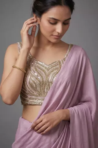 Light purple beads work shiny georgette partywear saree with full of beads work blouse fabric.