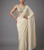 Cream beads work shiny georgette partywear saree with full of beads work blouse fabric.