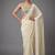 Cream beads work shiny georgette partywear saree with full of beads work blouse fabric.