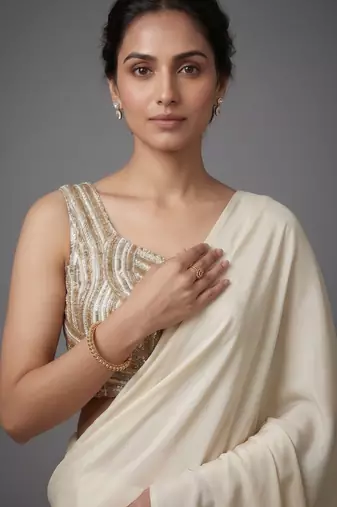 Cream beads work shiny georgette partywear saree with full of beads work blouse fabric.