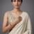 Cream beads work shiny georgette partywear saree with full of beads work blouse fabric.