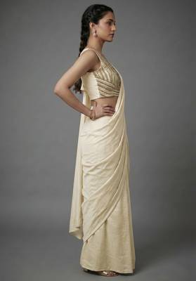 Cream beads work shiny georgette partywear saree with full of beads work blouse fabric. 3