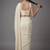Cream beads work shiny georgette partywear saree with full of beads work blouse fabric.