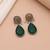 Green color dual tone oxidised earrings