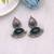 Green color dual tone oxidised earrings