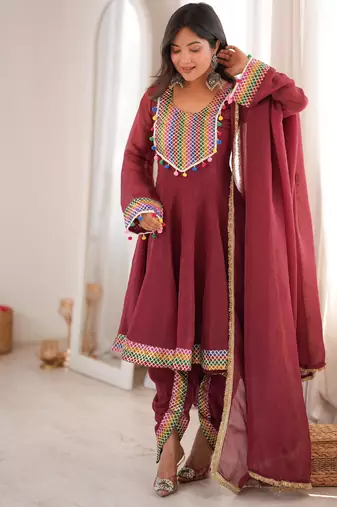 maroon peplum kurti with dhoti salwar and multicolor embroidered border