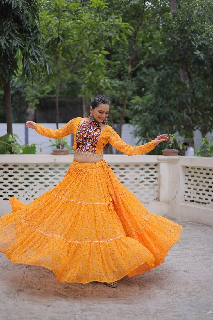 NAVRATRI WEAR YELLOW COLOR GEORGETTE BANDHEK PRINT LEHENGA CHOLI FULL STITCHED.