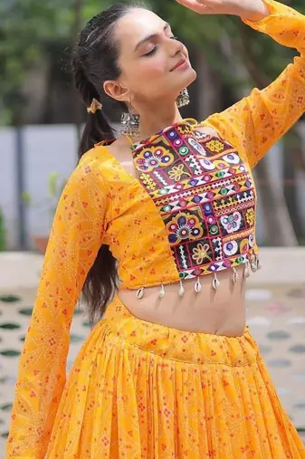 NAVRATRI WEAR YELLOW GEORGETTE BANDHEK PRINT LEHENGA CHOLI FULL STITCHED.