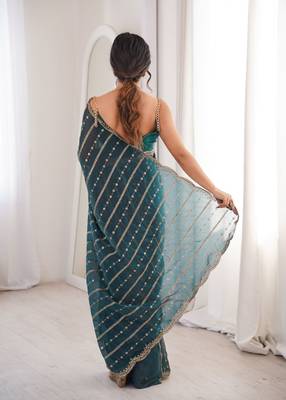 Teal fendy satin sequence embroidered saree 4