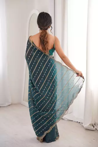 Teal fendy satin sequence embroidered saree