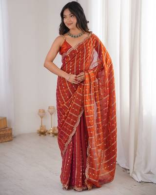 Orange fendy satin sequence embroidered saree 1