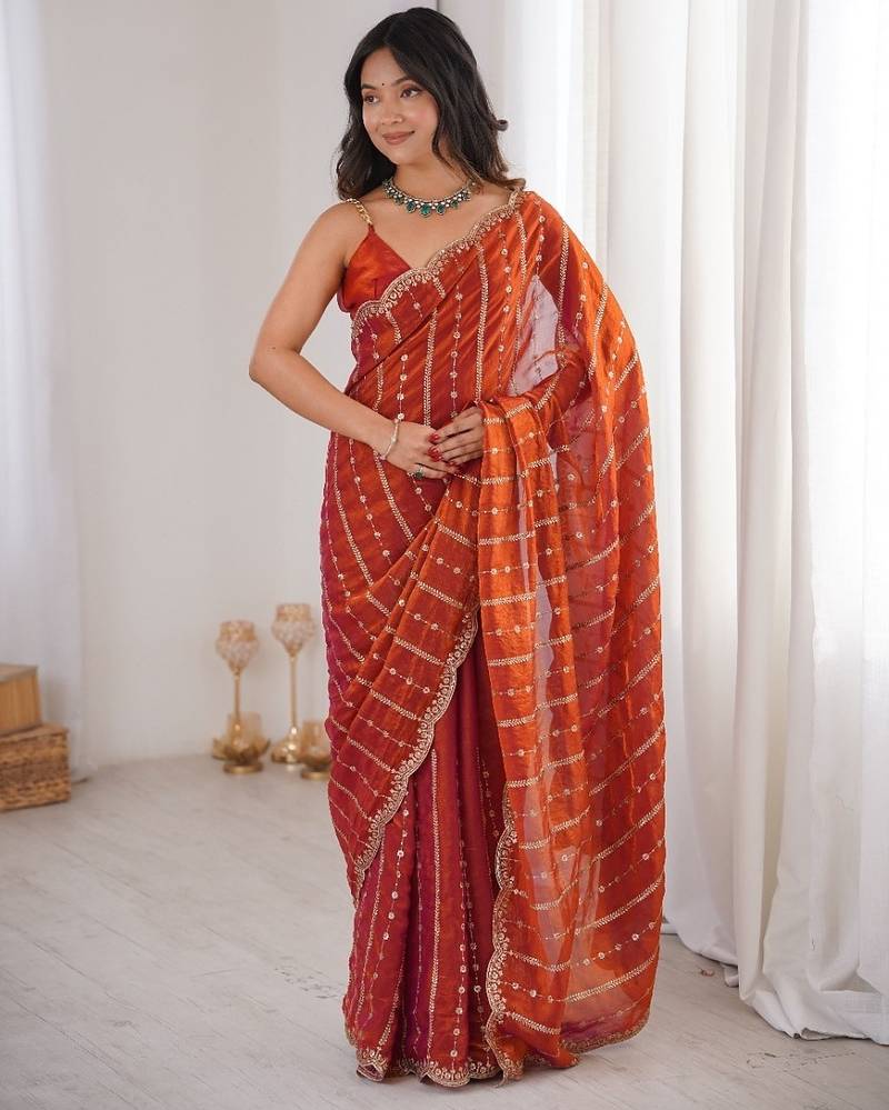 Orange fendy satin sequence embroidered saree
