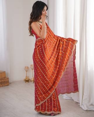 Orange fendy satin sequence embroidered saree 2