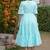 Sea green solid cotton tiered midi dress for women