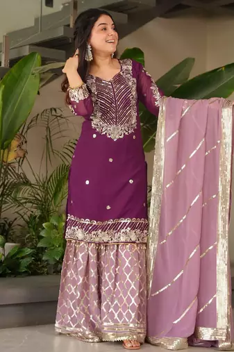 Purple heavy embroidered fox georgette palazzo suit set with dupatta