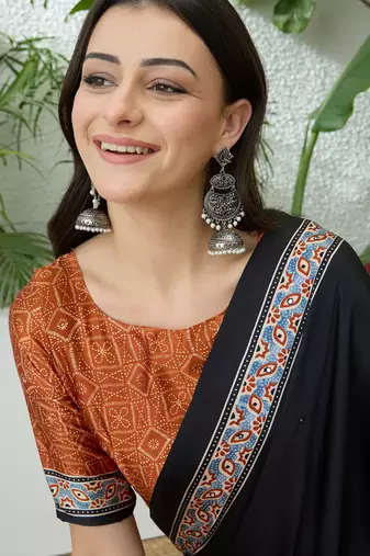 Rust orange instant wear saree with unstitched blouse material