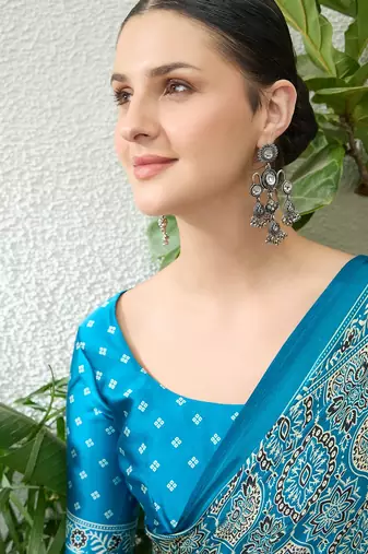 Teal green embroidered ready made saree with blouse fabric