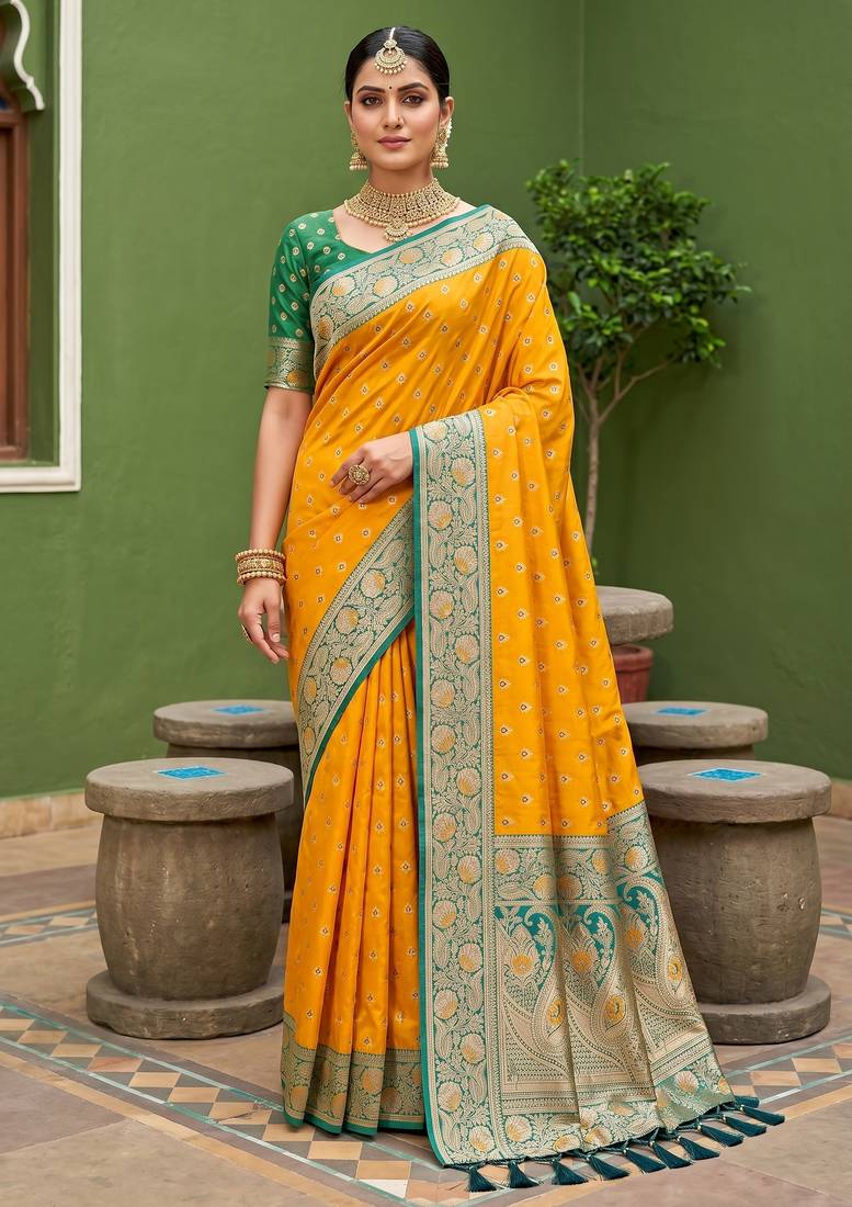 Yellow soft banarasi silk blend saree with zari weaving meenakari design