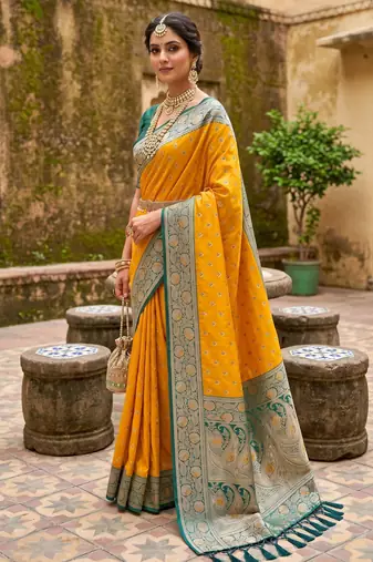 Yellow soft banarasi silk blend saree with zari weaving meenakari design