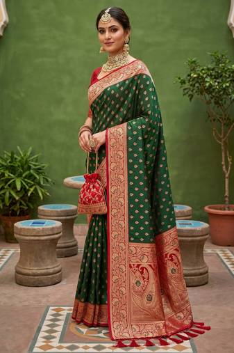 Green soft banarasi silk blend saree with zari weaving meenakari design